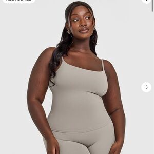 SOFTMOTION STRAPPY VEST WITH BUILT IN BRA SHELF WITH WHITE LOGO